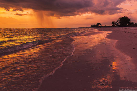 Rain at sunset  Honeymoon Island 8/23