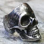 Engraved skull ring.