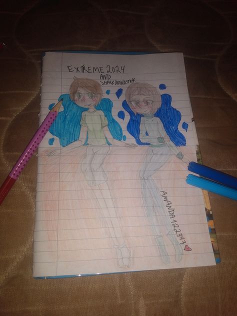 two boys sitting in a wall
