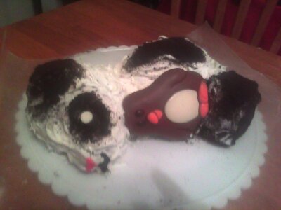 Panda cuddling a penguin cake!!