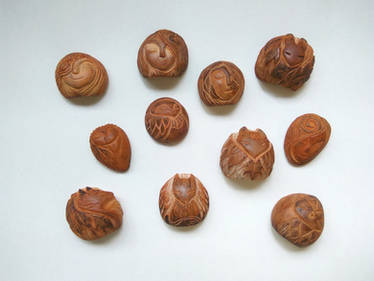 Avocado seed carvings