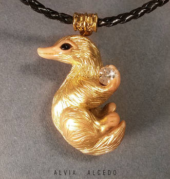 Golden niffler by AlviaAlcedo