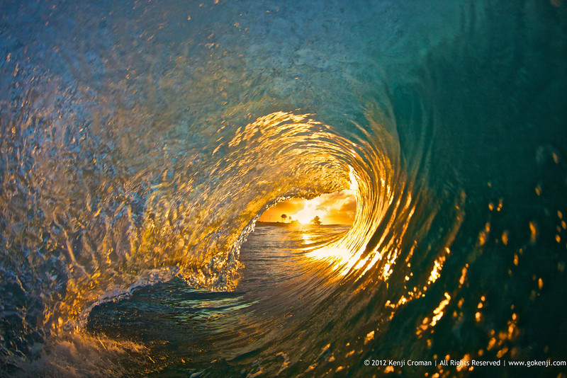 The Shot - A sunrise captured inside a wave barrel