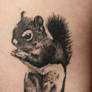 Squirrel tattoo done by Angelique Grimm