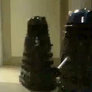 Daleks chasing Ash Brock and Misty