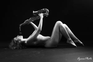 Women beauty and saxophone