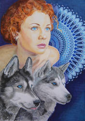 Woman-and-Huskies