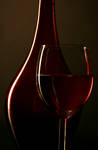 Wine bottle and a glass by foto4advert