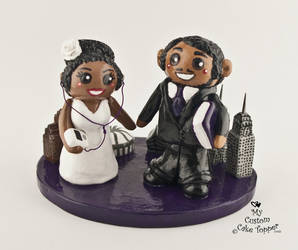 A Tale of Two Cities Bride and Groom Wedding Cake