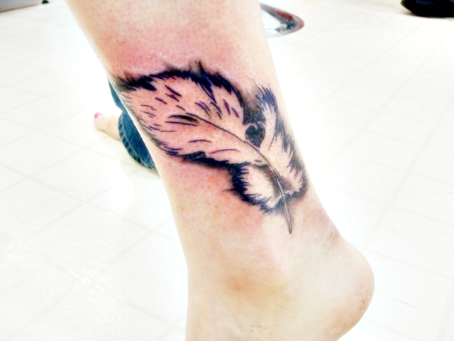 Feather Tattoo.