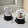 : pair of little kitsune snowglobes :