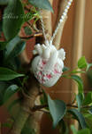 Anatomical heart with sakura flowers pendant