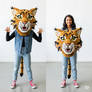 girl wearing a wildcat mascot head
