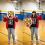 girl wearing a tiger mascot head