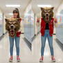 girl wearing a werewolf mascot head