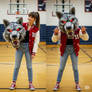 girl wearing a werewolf mascot head