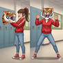 girl wearing a tiger mascot head
