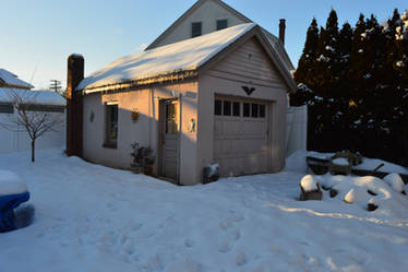 Snow covered shed.