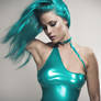 Sexy girl wearing turquoise latex