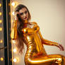 Sexy girl wearing gold latex 15