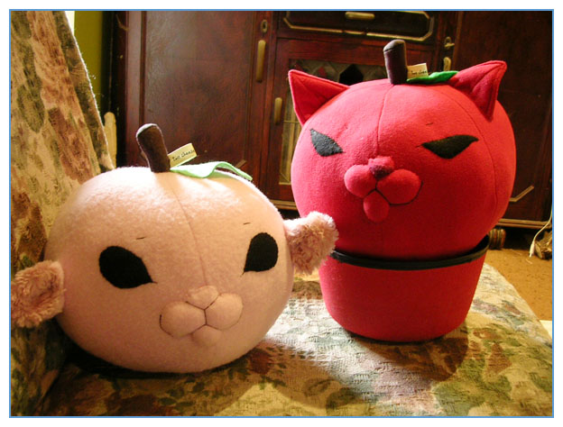 Peach and Apple Kitty plushes