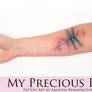 Freehand watercolor dragonfly tattoo.