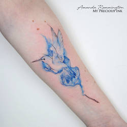 Freehand watercolor patronus hummingbird tattoo