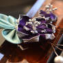 The Best Man: boutonniere lotus pin.