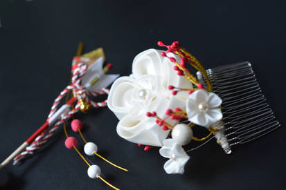 Grand white ume kanzashi, the end of winter motif.