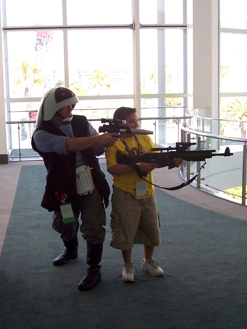 Strike the pose and up the blaster, kid by locomotiva