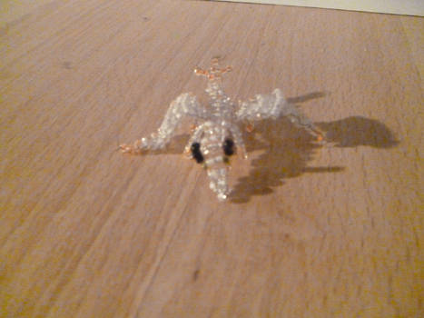 Beaded orange and white dragon