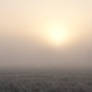 Sunrise Through the Fog