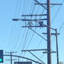 2 Robots Hanging Out On A Power Pole