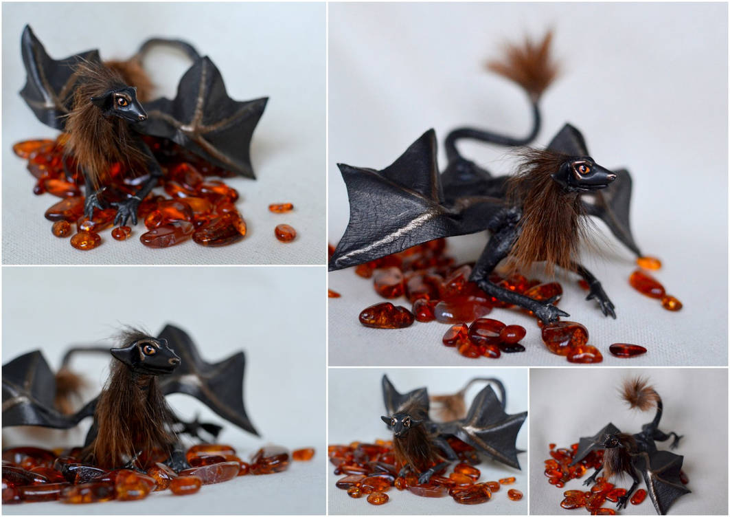 Small gold-black dragon with orange eyes by murosvur Small gold-black dragon with orange eyes by murosvur