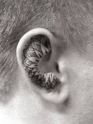 Inner ear tattoo done by James @reillytattoos pert