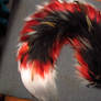 Fiery Tail with Feathers