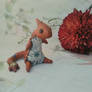 Dingy, stuffed Charmeleon from clay