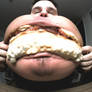 Guy devouring whole burger