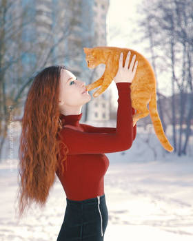 Holding the red cat