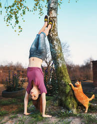 Handstand against tree