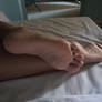 Filipina soles on bed