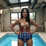 wonder woman standing beside  that famous pool