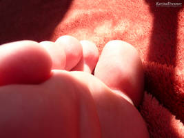 My toes in sunlight and shadows