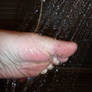 Karina naked feet under the shower