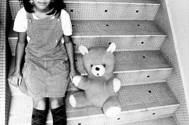 Girl with a teddy bear