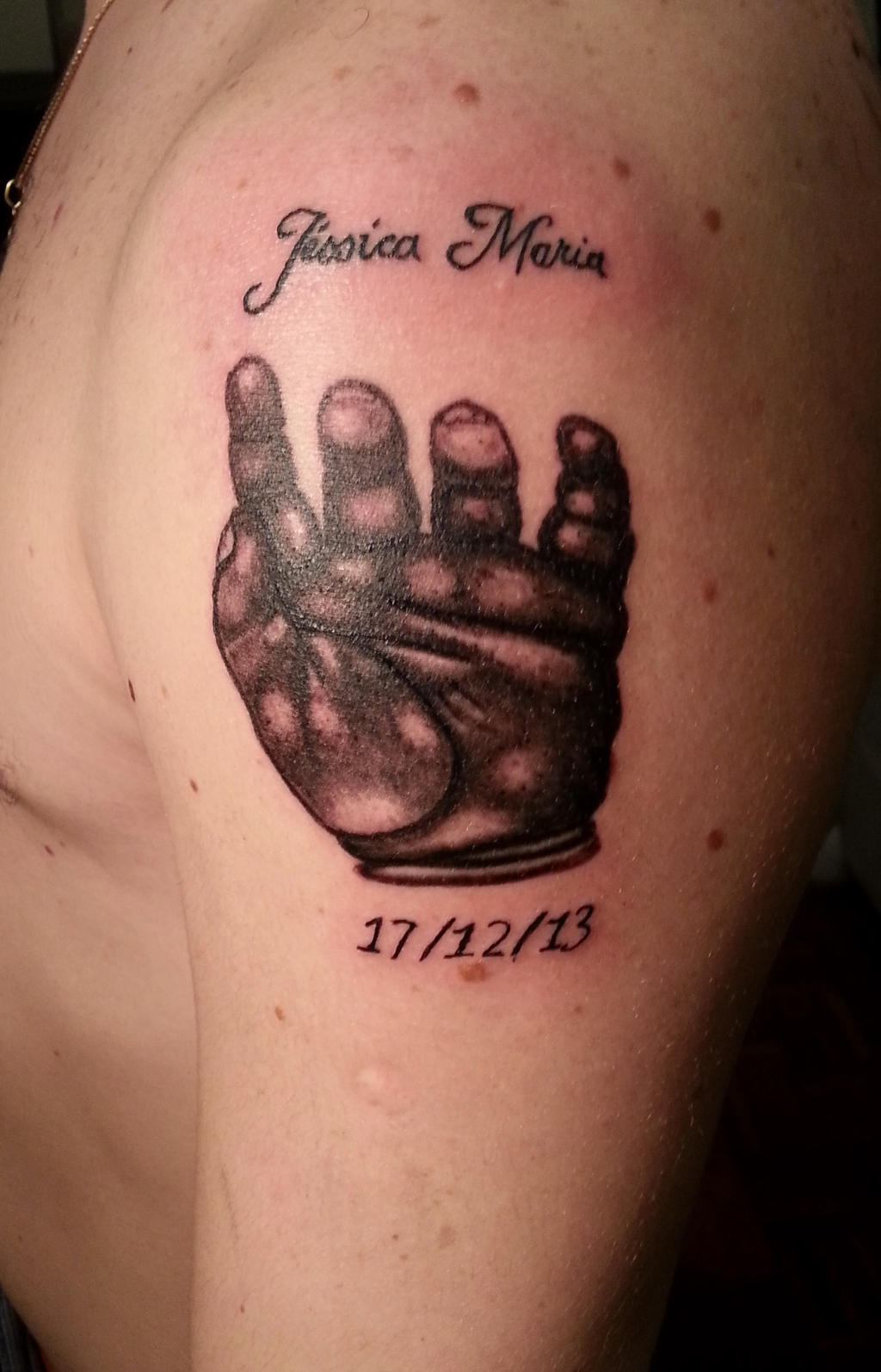 Baby hand tattoo