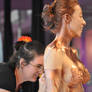Cat drips gold body paint