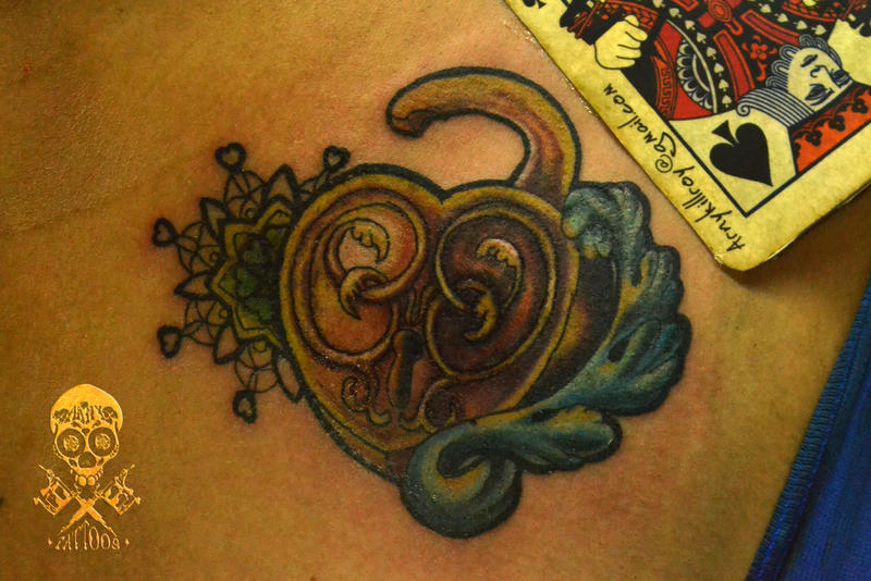 Heart shaped lock tattoo