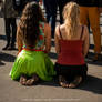 A barefoot girls at a city festival (c) FEET.SU