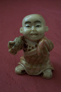 Netski Carved Oriental Man
